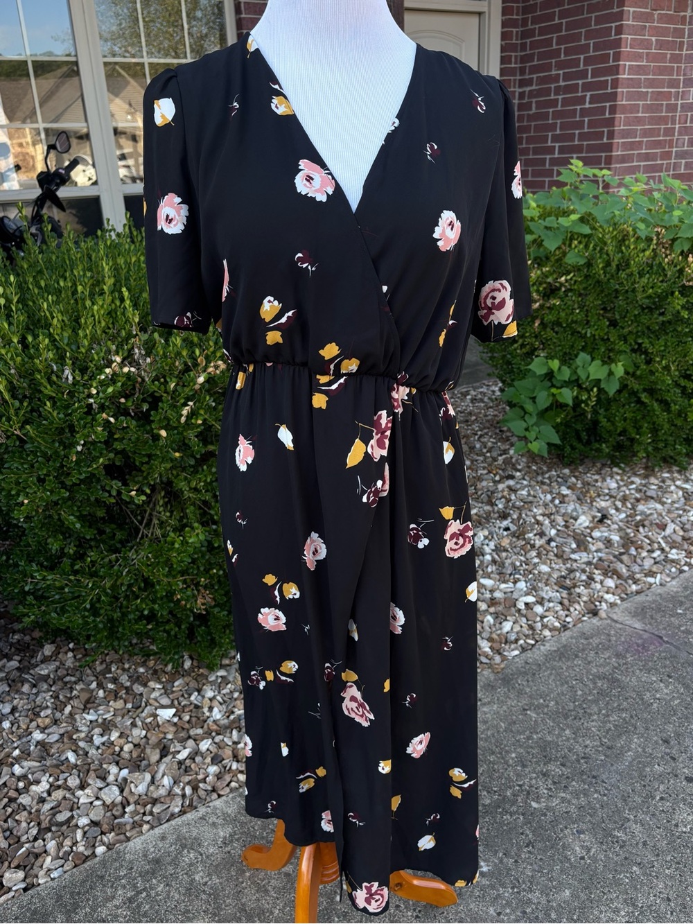 1. State Black Floral Wrap Midi Dress with Pink and Mustard Accents